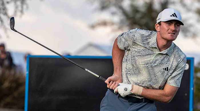 Amateur Nick Dunlap watches a tee shot during the final round of the 2024 American Express.